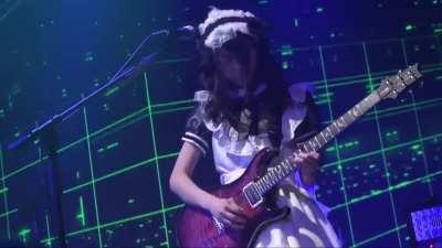 Her name is Mincho. She plays guitar. Enough said. P.1