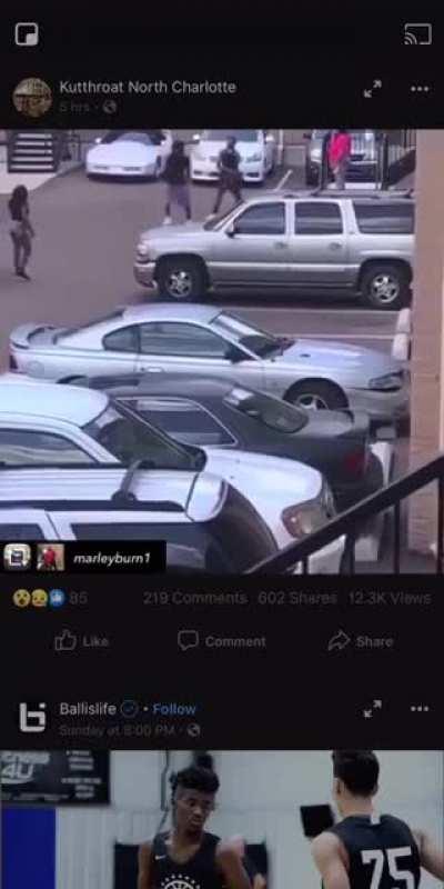 Guy with pistol drops gun to fight another guy with gun, ends up paying the ultimate price.