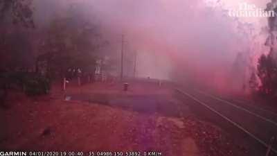 Bushfire quickly overruns firefighter's.