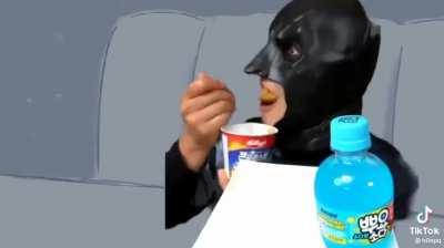 Why is man eating like that?