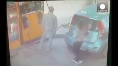 dumbass bitch sets poor guys cars and a petrol pump station on fire