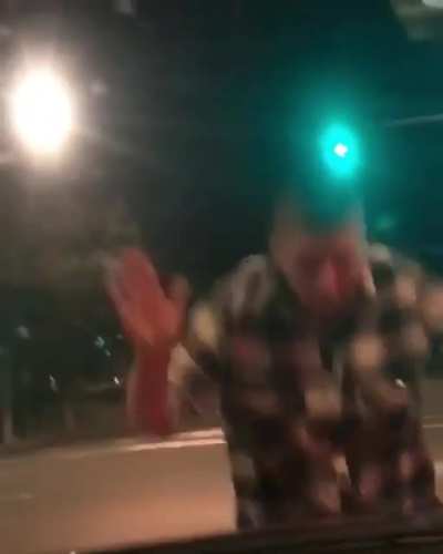 Karen flips over some guys car while he is driving