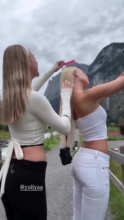 Polina Malinovskaya - Getting her Hair Combed in White Pants and Crop Top with a Mountain View | IG Story Clip, September 2025