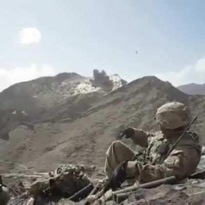 U.S. Army soldiers call in airstrike on enemy position in Afghanistan.