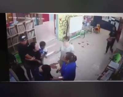 Man beats teacher for beating his kid. Second woman seemed innocent though. 