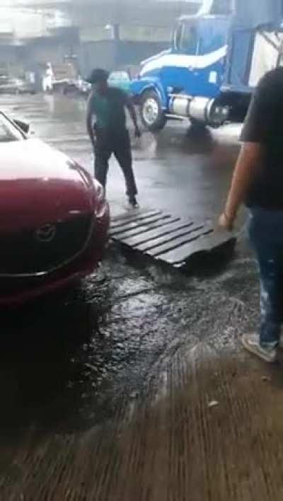 Asking his employee to put a pallet over the water so he won't get his shoes wet