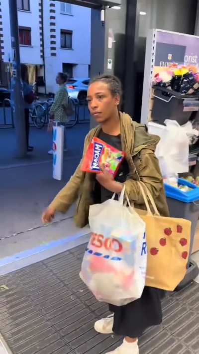 A woman wearing a Tesco jacket was caught stealing again at the Coop store, part 2.