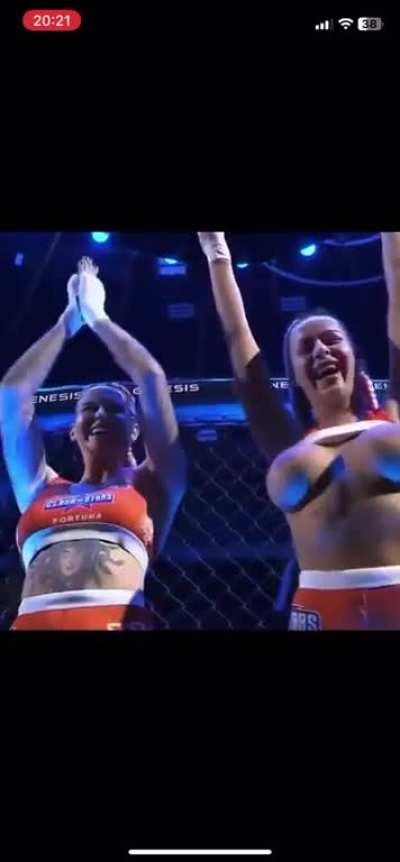 Female fighters Inked Dory and Karina Pedro flash their boobs at the crowd during MMA event in Prague