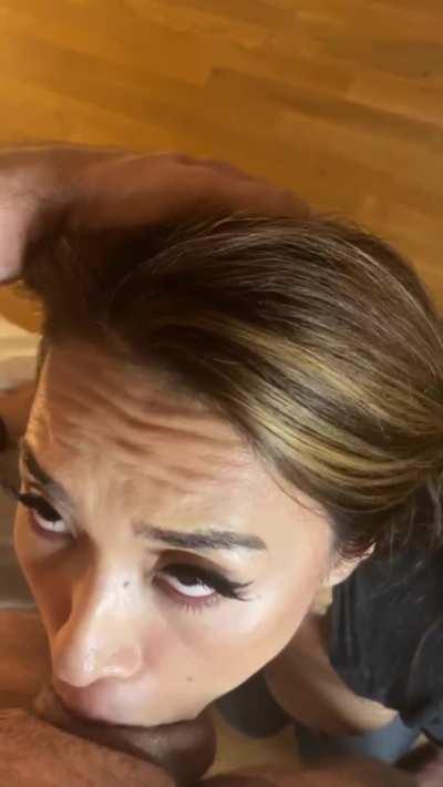 Getting deepthroated with her tits out