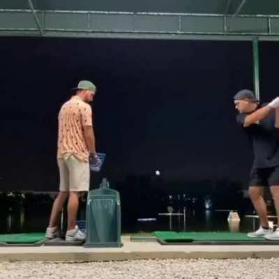 baseball player golfing