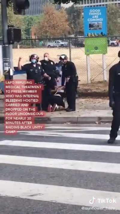 An unarmed member of the press was dragged through the street by the LAPD, who wouldn’t render him aid, despite his cries of pain.