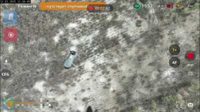 A quadcopter of the 2nd battalion of the 81st Airmobile Brigade of the Armed Forces of Ukraine using a rope with a load knocks down Russian quadrocopters. February 2025, somewhere in the airspace.