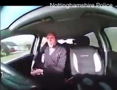 Angry Brit in the car.