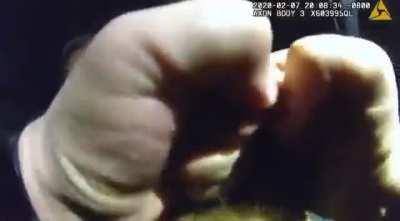 WARNING GRAPHIC: Police K-9 locks onto man's throat for over a minute shredding his windpipe and fracturing thyroid cartilage; he was suspected of helping his girlfriend steal tequila from a Safeway.