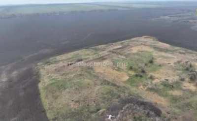 Drone vs. drone modern warfare is witnessed as a Ukrainian army drone knocks down a Russian army drone.