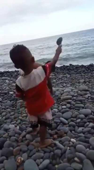 Teaching younger brother how to skip stones