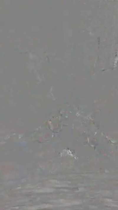 Beautiful Latina stroking my dick with her feet