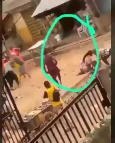 Looking at ongoing fight while walking with your child.