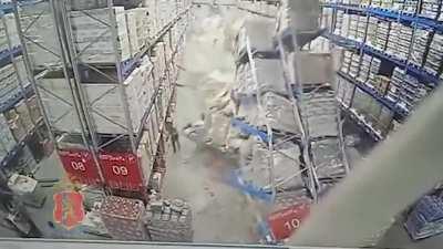 Warehouse racks collapse.