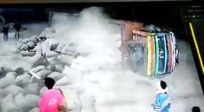 WCGW Fixing a puncture of a loaded truck