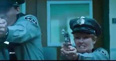 In Blade (1998) the policeman tell Blade to freeze and he turns without resisting however after seeing he is a black man the police fires at him