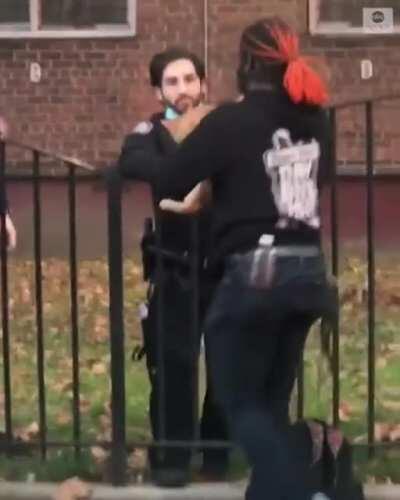 Horrible cops throw cat into a burning building