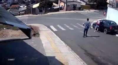 Guy jumps into a out of control to stop it from crashing