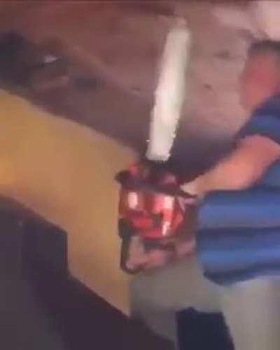 This guy using a chainsaw...