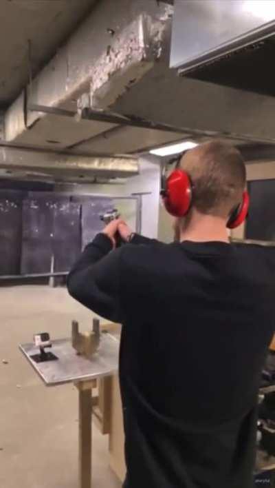 Guy almost taps his head with the second shot