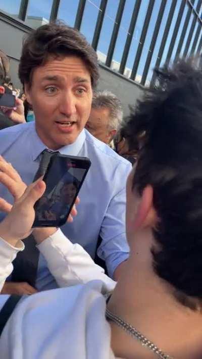 PPC Supporter tries to argue with Trudeau at UofM campus this morning.