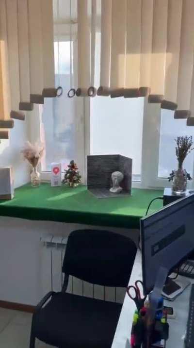 Russian goes to window during live shelling in Belgorod.