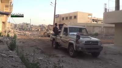 FSA ZU-23-2 Toyota technical engages Syrian Army targets in Daraa City - 5/23/2013