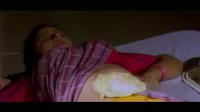 Nagma is so hot, Prabhu Deva makes a frickin omelet on her belly.