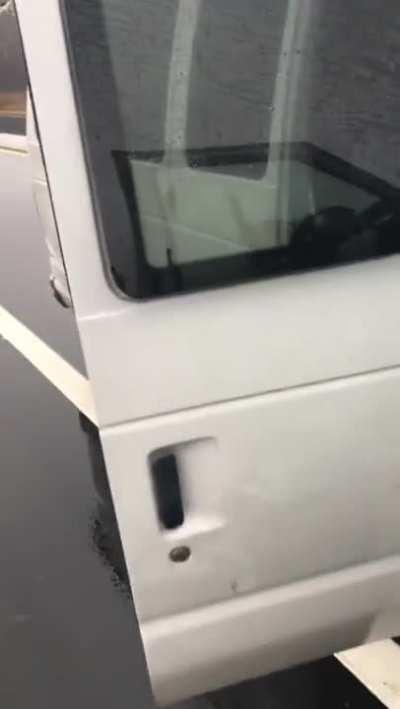 Aftermath of a tree trunk hitting the windshield.