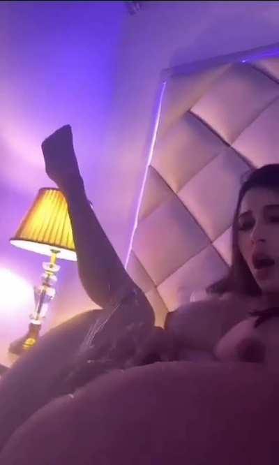 Sexy Latina pissing in her bed