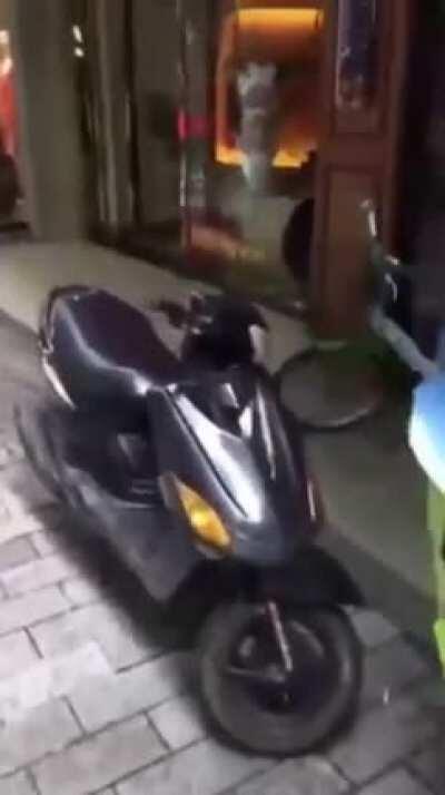 if I rev my motorcycle next to this glass building?