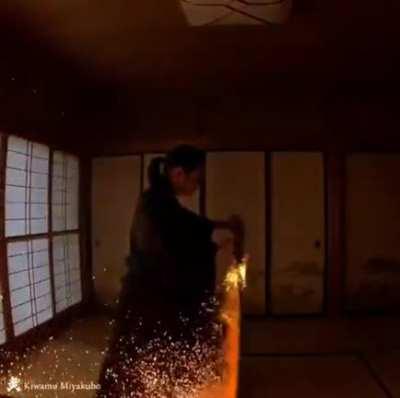 Tanjiro using Hinokami Kagura