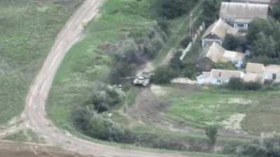 A longer, higher definition version of the video posted earlier this week of the Russian tank firing and soon after takes a hit and explodes, Kharkiv region