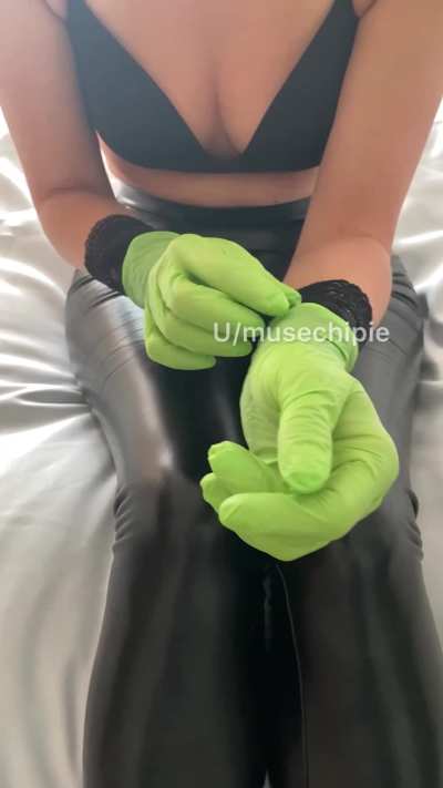 Shiny leggings and latex gloves