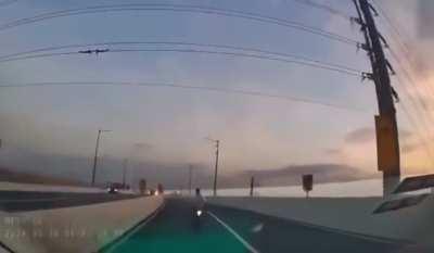 Drunk motorcycle driver in the Philippines drives on the wrong lane and crashes into a car 