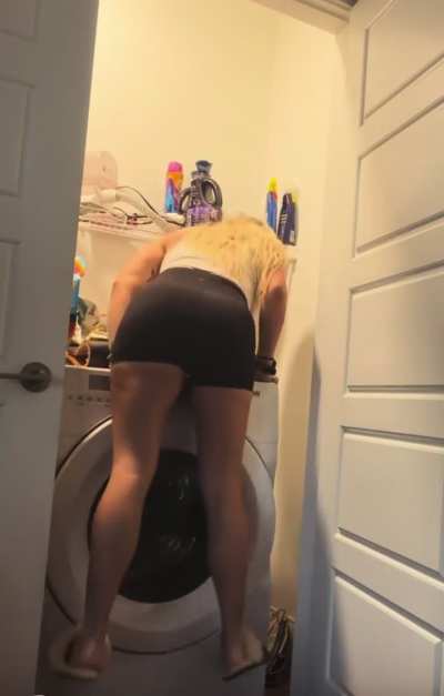 Reaching for stuck behind dryer
