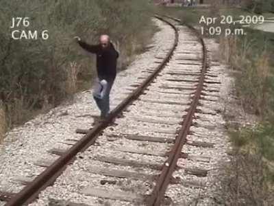 Man gets hit by train...