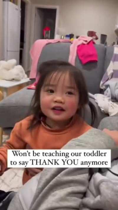 Teaching their little Asian daughter to say 