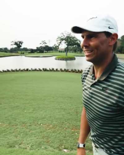 Nadal’s golf swing is like his trying to rip a backhand down the line