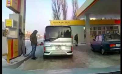 Idiot at a gas station