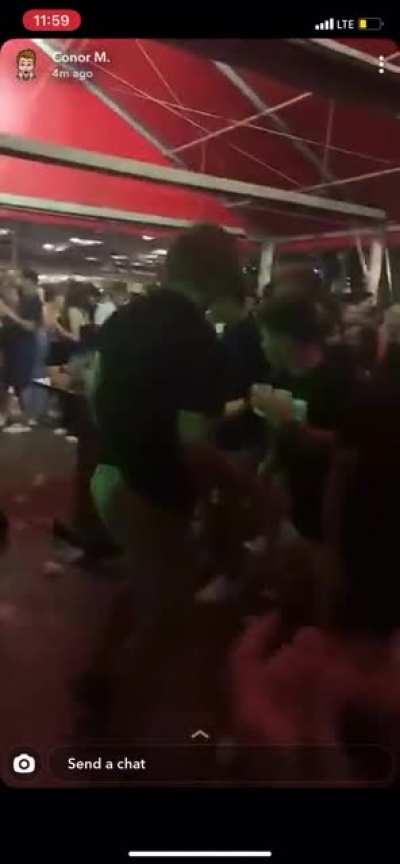 Kid takes a shot at a college bar then gets paralyzed by his friend