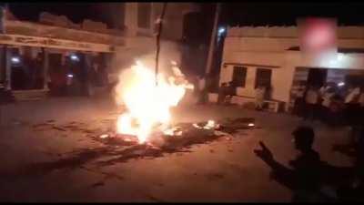 Guy Messes With A Bonfire, Falls Into It