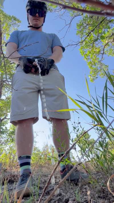 Had to pull over during my mountain bike ride to relieve myself on the side of the trail. Felt good to whip it out in the breeze cause it was so sweaty. 