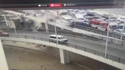Truck slams through heavy traffic. 