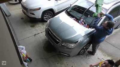 WCGW hanging the piñata over the wipers and then turning the car on